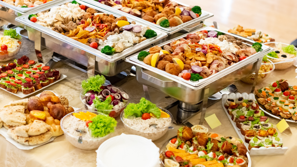 A buffet spread with many dishes for a celebration